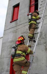 PASSING ON A LADDER Sometimes, in emergency situations, firefighters may need to pass each other on a ladder.