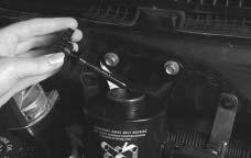 Power Steering Fluid See Engine Compartment Overview on page 5-12 for the power steering fluid reservoir location.