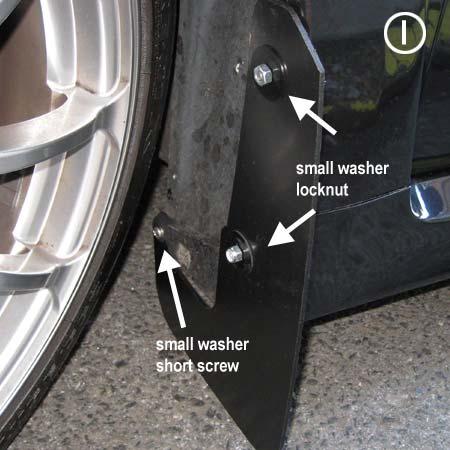 Fitment is correct when fender cover lip can be slightly compressed by hand and rests comfortably against protective rubber gaskets behind bracket tabs.