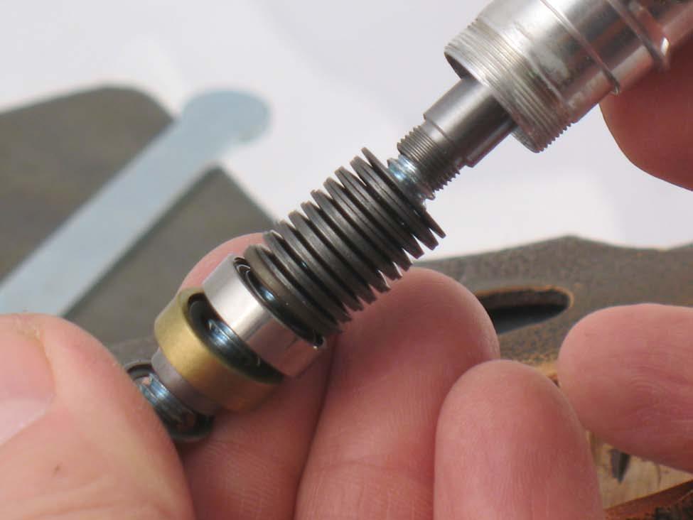 8. Use a 1/4" (6 mm) Ø diameter by ~5" (~127 mm) long screw and carefully slide, 60088 Front
