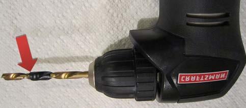 20. With a ¼ drill bit installed in your drill, apply several wraps of