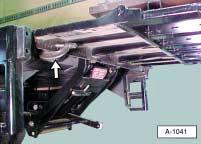 a. Use two large C-clamps, as shown below, to hold the liftgate in place. Illustration 5b. Align the ce