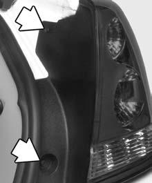 2. Unscrew the two fasteners located on the inside of the trunk at the rear of the vehicle. 6.