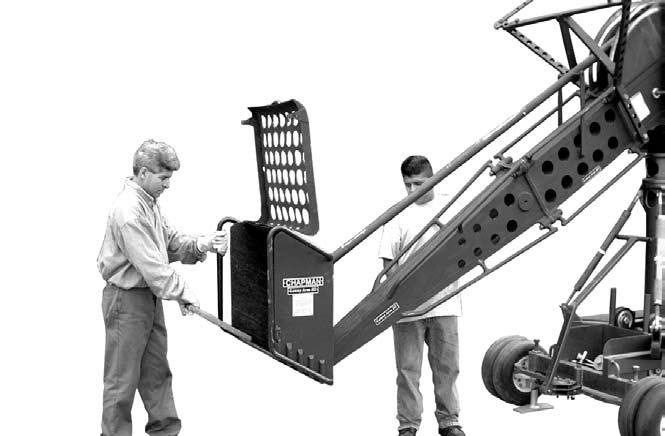 Chock or lock the wheels to secure the Accessory Cart s position beneath the Arm.