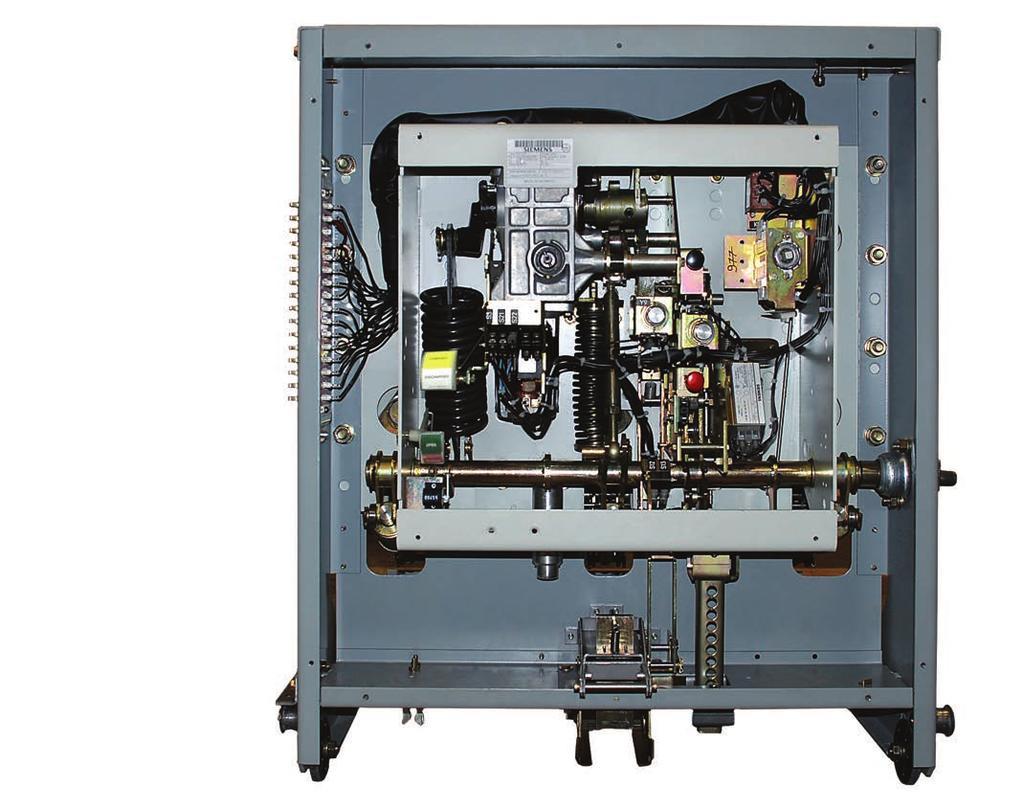 Vacuum interrupter/operator Figure 8: Front view of type GMSG vacuum circuit breaker with front panel removed 1 Closing spring 2 Gearbox 3 Opening spring 4 Push-to-close 5 Auxiliary switch 6 Close