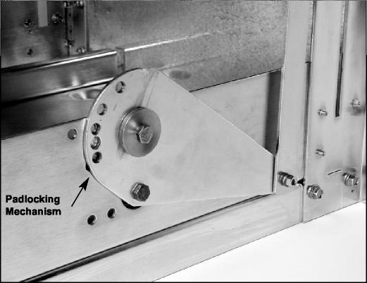 A padlocking device is provided on the side of the cassette to permit padlocking the primary safety shutters in an open position for inspection or in the closed position to prevent inadvertent