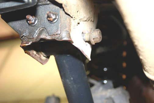 11. Adjust new lower control arm to 16.5 from center to center and install using factory hardware. SEE PHOTO 5. 12.