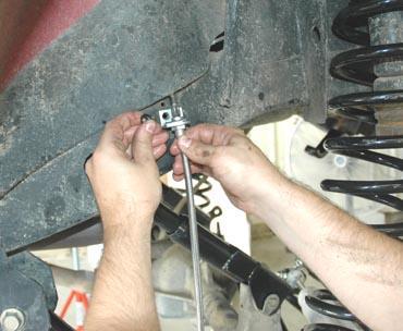 Remove rear factory shocks using a 13mm wrench on top and a 3/4 wrench on bottom and retain hardware. 2.