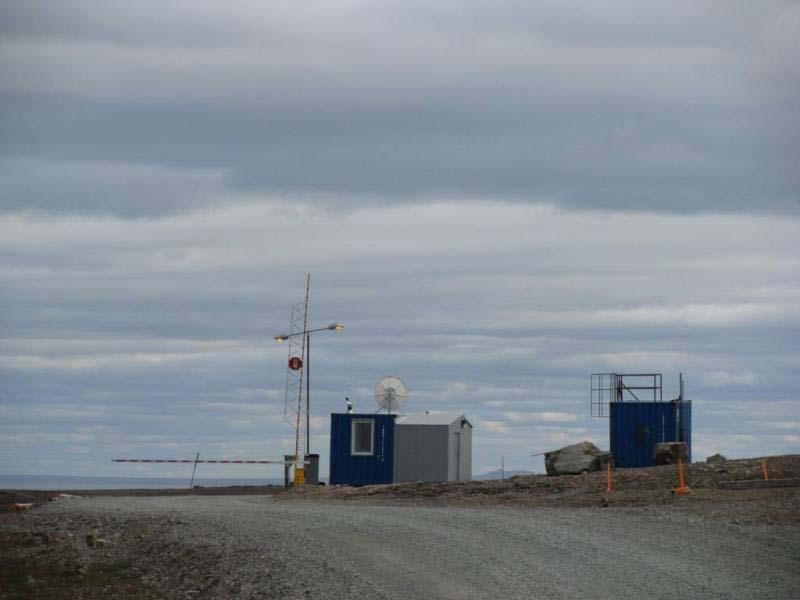 Photo 10: Gate and gatehouse looking south toward Baker Lake. 3.4. Marine Environment a.
