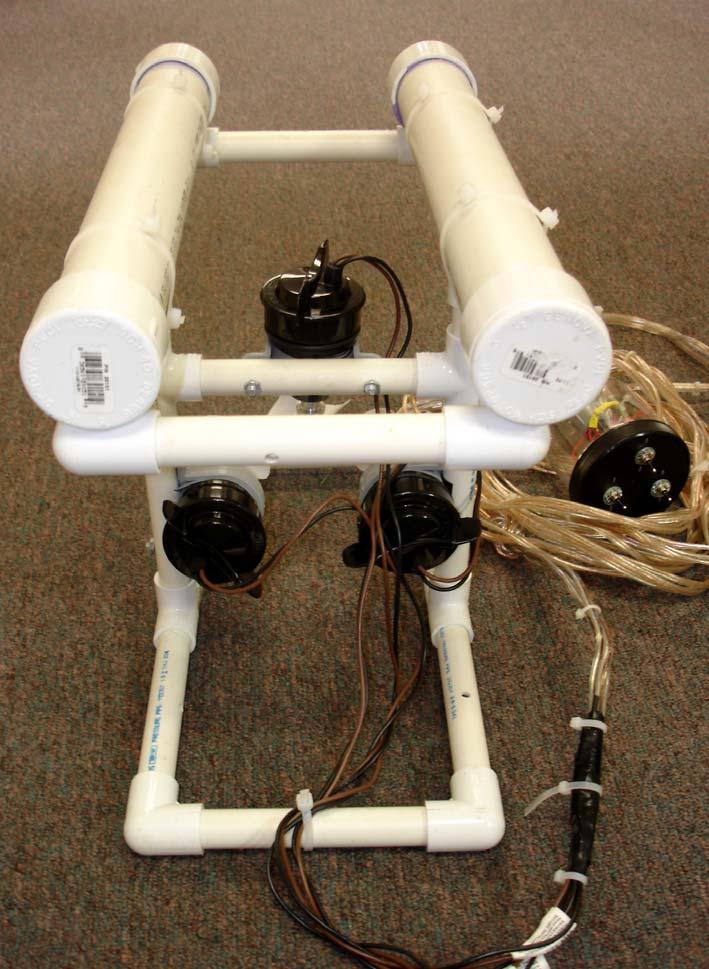 Figure 1.4: This is a rear view of the ROV. The wire tether is attached to the thrusters from the rear.