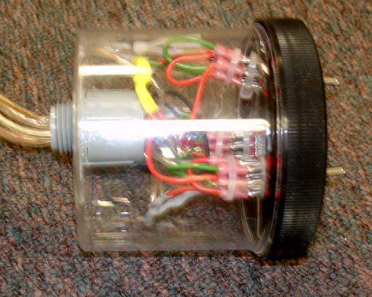 The controller contains all of the switches and wires that make the ROV go up, down, forward, backwards, and turn (Figure 1.5 and 1.6). Figure 1.5: The inside of the controller jar.