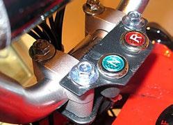 ATV. Attach handlebar clamps and gear position indicator