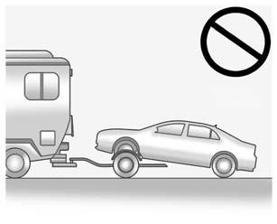 10-80 Vehicle Care Dolly Towing (Rear-Wheel-Drive Vehicles) Use the following procedure to dolly tow a rear-wheel-drive vehicle from the rear: 1.