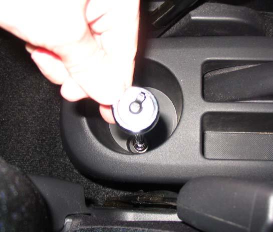 Unscrew the shift knob by rotating counter clockwise. 2.