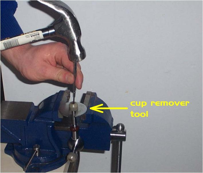 Hang the shifter from the tool as shown, be sure the shifter is inserted completely into the slot in the tool.