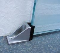 Black glass centering assemblies integrated in wall profile. Screw-on grey glass centering assemblies.