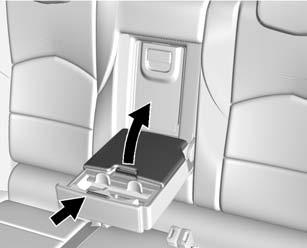 position. The cover will return to normal operation after the obstruction is removed. Armrest Storage Pull the armrest down to access the rear seat storage area and cupholders.
