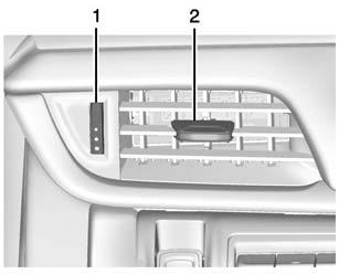 Move the slider knobs (2) to change the direction of the airflow. Additional air vents are beneath the windshield and the driver and passenger side door windows.