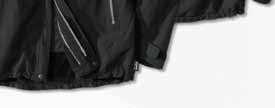 Black/grey. Outer material 96% poly amide/4% elastane. Warm tricot lining in polyester. Windproof and water-repellent (10,000 mm waterproofing), bonded seams.