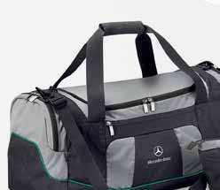 60 TRAVEL 1 SPORTS BAG. Anthracite/silver-coloured/Petronas green. Nylon/polyester. Large main compartment. Various outside pockets.
