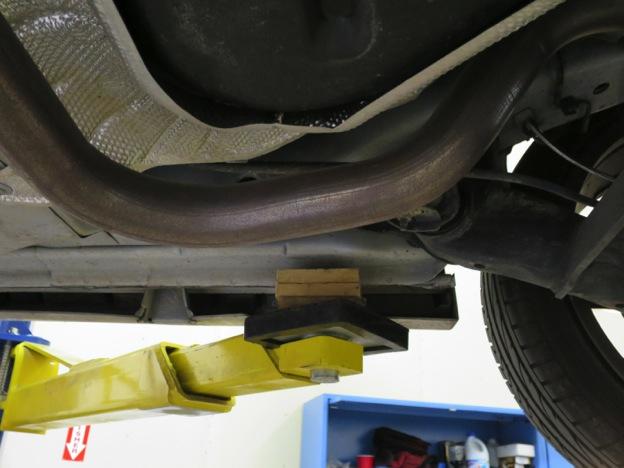 Removing Factory Exhaust 1. First thing is first; get the car up on a lift or on jack stands/ramps. Make sure the parking brake is firmly engaged. 2.