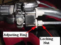 The brakes are equipped with a wear indicator to alert you when your brake shoes need replacing. Apply light pressure to the brake lever and slowly push the unit forward.