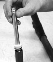 To remove the IFP, insert a long dowel rod (plastic or wood) into the Pure tube until the rod touches the underside of the IFP.