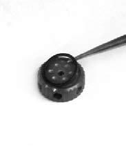 Slide rebound knob, with detent features interfacing with the detent ball, back into shaft 