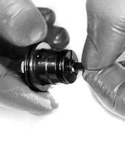 instead, use your fingernail to remove to avoid damaging the valve