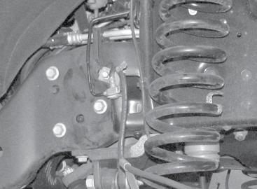 SEE FIGURES 21-24 2011 factory configured brake line shown below FIGURE 19 17.