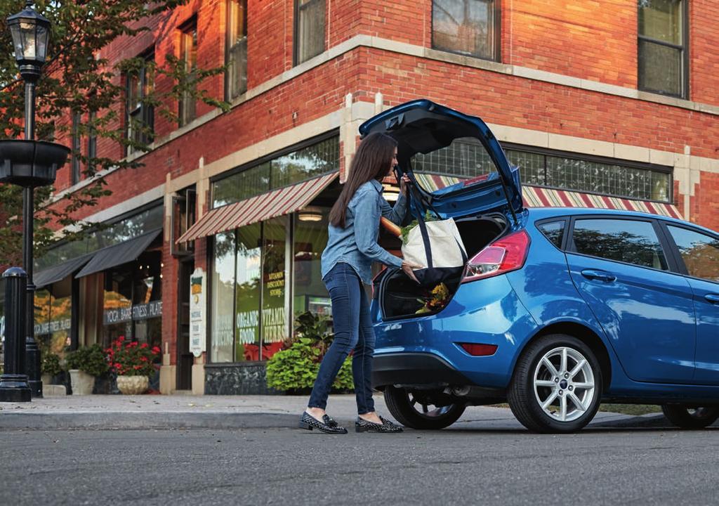 PUT THE FUN IN FUNCTIONAL. Enjoy easy access to the rear cargo area in Fiesta Hatchback. With both sides of the 60/40 split rear seat folded down, you ll find 25.4 cu. ft.