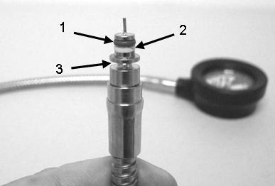 Backup ring is a split ring. (2) Inspect O-ring (1, Figure 6-64) and back-up ring (2) on remote pressure indicator high-pressure hose for nicks, cuts, wear and tear, or foreign debris.