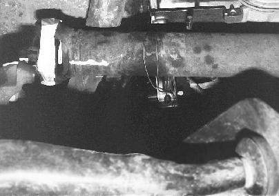 Again, Rancho Suspension is not responsible for damage or failure resulting from improper installation of this kit. the spring to the coil tower. Lower the jack enough to remove the spring.