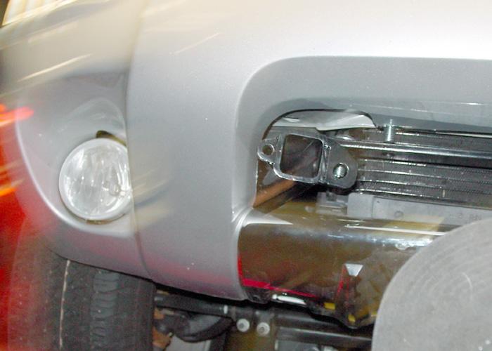 Remove the spring nut clips from the bottom of the bumper core (Fig.H). 5.
