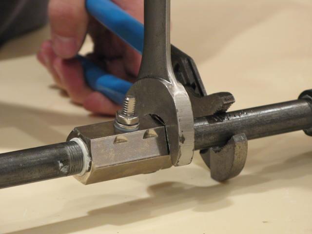 13. Remove the mounting bracket.
