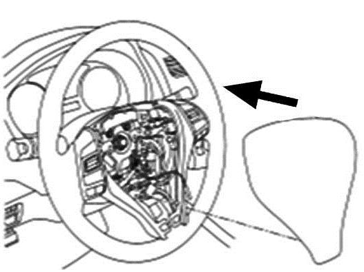 b) c) Connect the brown wire onto the spade terminal on the the air bag module as shown in Fig. 45. Insert brown wire into the appropriate hook as shown in Fig. 45. Be sure all electrical connectors are engaged and locked before horn/air bag assembly is installed.