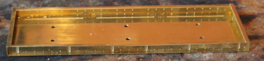 4. Click one of the sole-bars in to the half etch slot that runs between the two buffer beams.