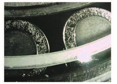 Make a careful inspection and look for the following: Corrosion Metallic debris Pitting Metallic flakes Other signs of damage