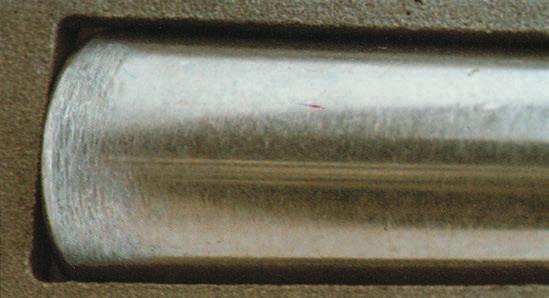 Pitting Small end of the roller shows excessive wear, the result of loose