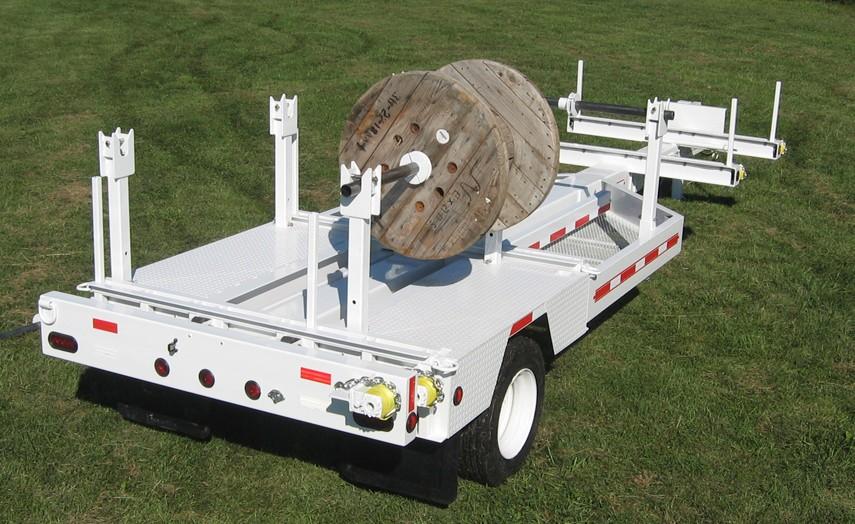 shaped spindle catch for easy loading. Enhances the utility of the trailer.