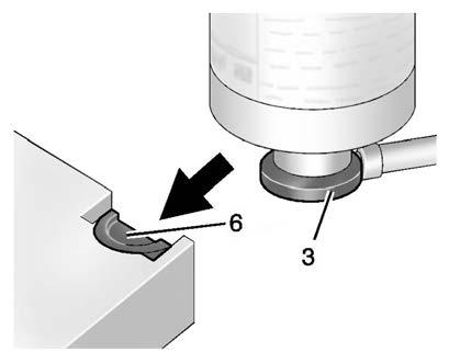 5. Slide the base of the tire sealant canister (3) into the slot on the top of the compressor (6) to hold it upright.