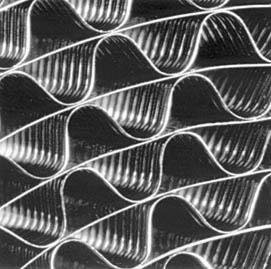 In Transversal Foil Structure (TS) the corrugated foils are embossed with secondary micro- corrugations (Figure 4.
