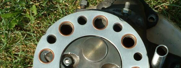 Exhaust Valve Spark Plug Intake Valve Pressure Transducer Head Gasket Head Gasket Notch Figure 2.5. The cylinder head and gasket.