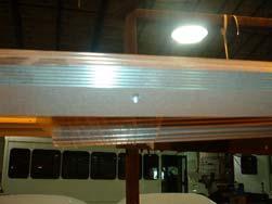 Rain Gutter Mounted above windows and seals roof