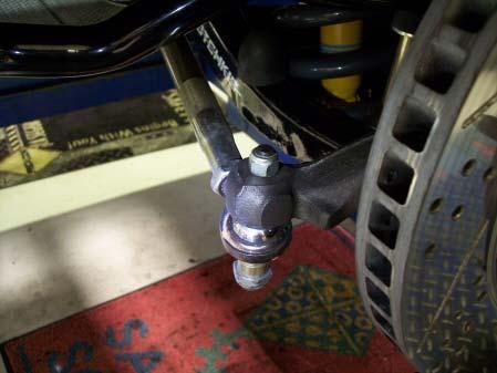 outer tie rod end and remove the cotter pin using a pair of