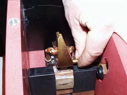 2. Secure the contact area against parts falling inside the breaker. See 1.2.1. [Fig. 52-1].