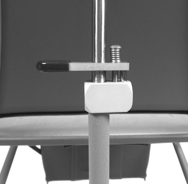 While lifting and holding seat, remove the leg adjustment pin from the right and left side.