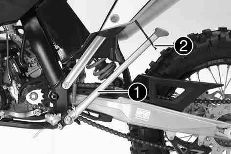 When you are riding, side stand must be folded up and secured with rubber band. B00086-10 5.