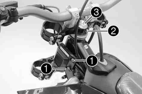 Do not unplug the CDI control unit. Remove screw. Remove screw, take off the top triple clamp with the handlebar and place it on one side.