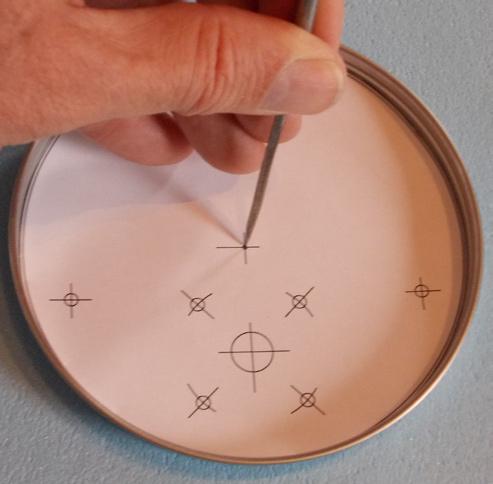 Cut out the pattern carefully ( Page 11) on the outer edge for the lid